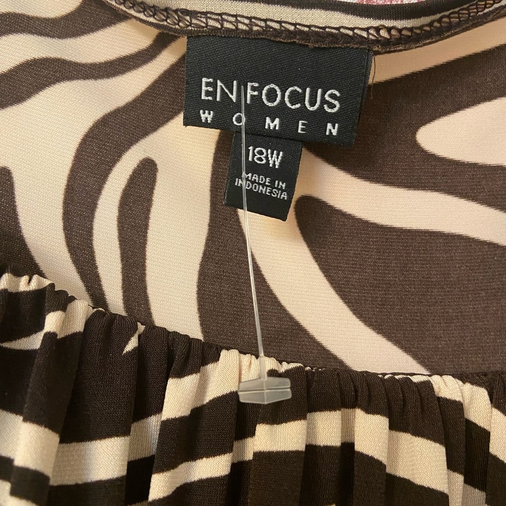 Beautiful brown dress. The material is so soft it will never wrinkle